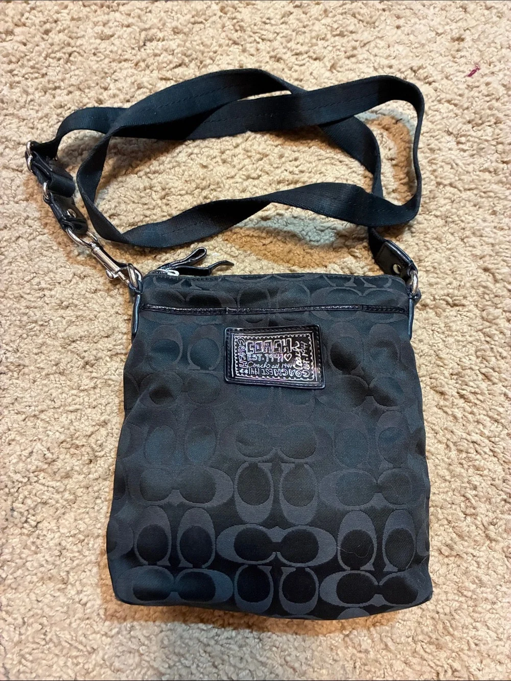 Coach Black Signature Crossbody Purse.Signature logo all over the bag.